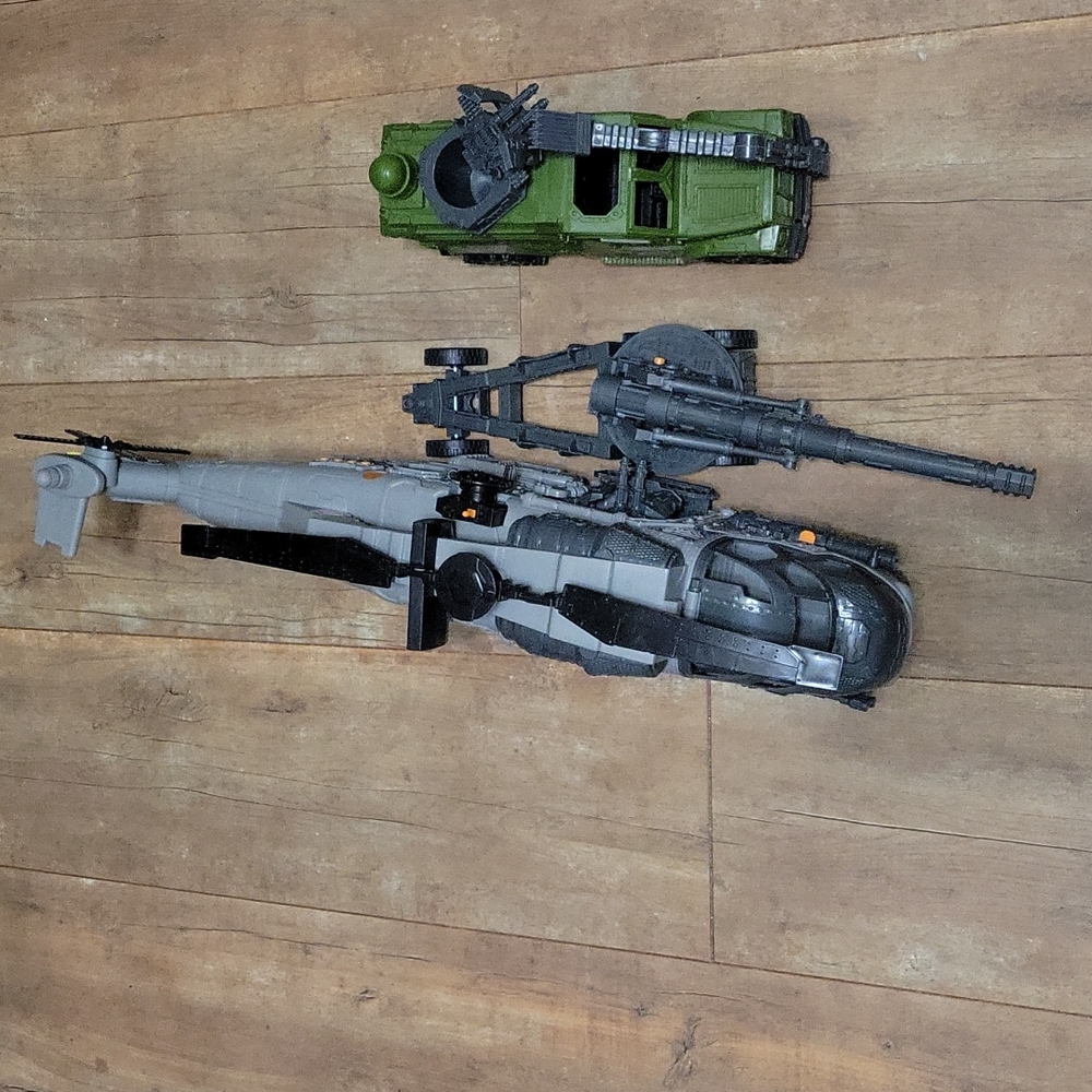Army helicopter and jeep and bomber.